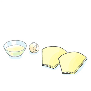 Ei in einer Schale, Eierschale und Papier